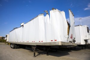 How Can a Truck Accident Lawyer Help- a white tractor trailer was in an accident