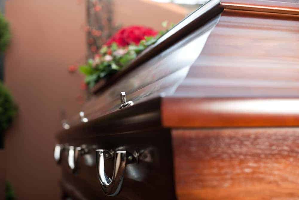 wrongful death attorney snohomish county - a casket with flowers